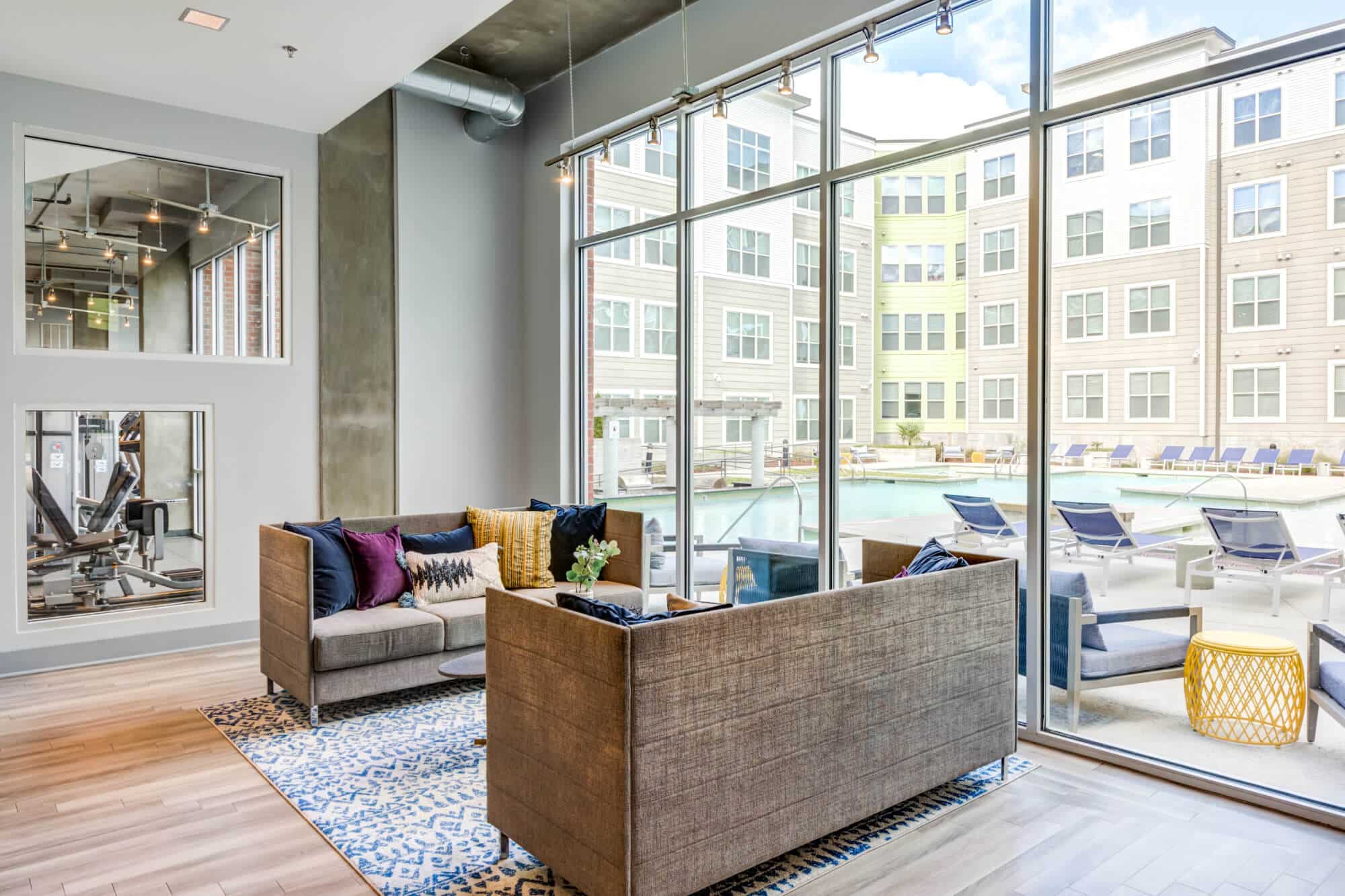 the boundary at west end off campus apartments near east carolina university ecu resident clubhouse lounge seating pool views